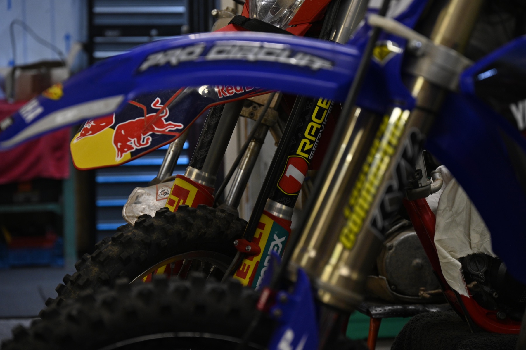 Motocross bikes inside the Race Services workshop